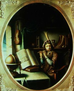 A man in a landscape, raising a beer glass