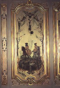 La Grande Singerie Monkey holding a jesters rattle