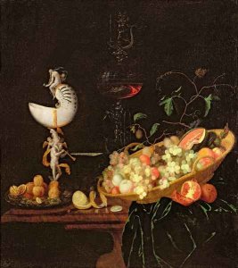 A Still Life of fruit with a nautilus cup on a draped ledge